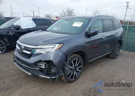 2022 Honda Pilot Awd Touring 7 Passenger z USA, uszkodzony, nr VIN 5FNYF6H64NB001352